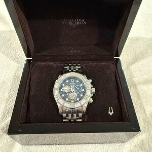 Bulova Men's Silver and Blue Stainless Steel Watch